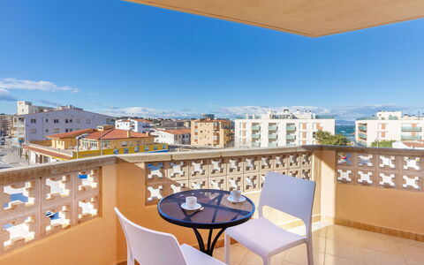 Policar: Sky, Property, Daytime, Furniture, Building, Azure, Chair, Lighting, Table, Architecture