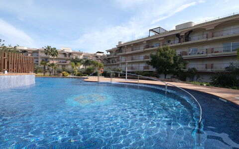 Golden Beach: Water, Sky, Building, Cloud, Plant, Azure, Swimming Pool, Tree, House, Window