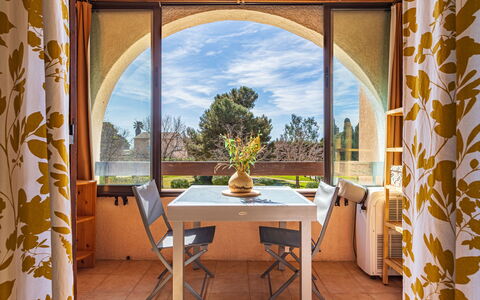 Les Iles du Soleil: Furniture, Apartment, Home, Balcony, Wood Stain, Shade, Chair, Eco Hotel, Outdoor Furniture, Houseplant