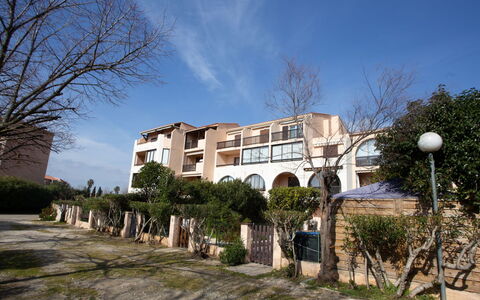 Les Iles du Soleil: Furniture, Apartment, Home, Balcony, Wood Stain, Shade, Chair, Eco Hotel, Outdoor Furniture, Houseplant
