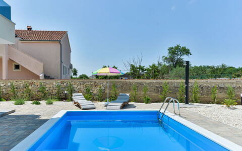 Sunset: Water, Plant, Sky, Building, Swimming Pool, Azure, Shade, Tree, Leisure, House