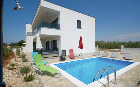 Sunrise: Sky, Plant, Property, Building, Water, Swimming Pool, Azure, Shade, Architecture, Land Lot