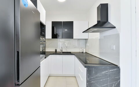 Sunrise: Countertop, Cabinetry, Tap, Furniture, Sink, Building, Kitchen, Interior Design, Plumbing Fixture, Wood