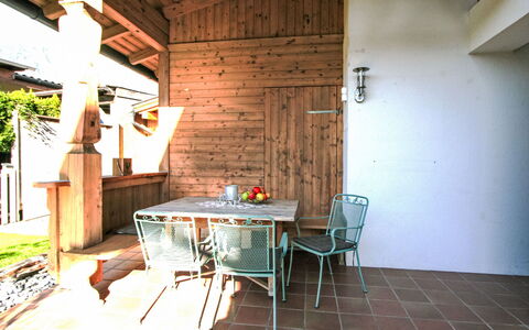Lisa: Furniture, Table, Plant, Wood, Chair, Building, Interior Design, Brick, Floor, Wall