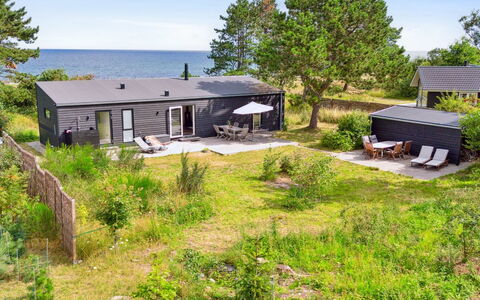Gjorgje - 100M from the Sea: Roof, House, Home, Cottage, Siding, Estate, Driveway, Garden Buildings, Yard, Shed