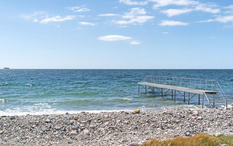 Henrik - 100M from the Sea: Grass, Shrub, House, Garden, Home, Cottage, Land Lot, Lawn, Groundcover