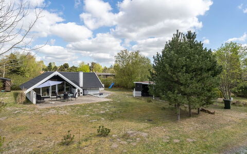 Arnfin - 160M from the Sea: Roof, House, Home, Cottage, Door, Siding, Deck, Porch, Plank, Hardwood