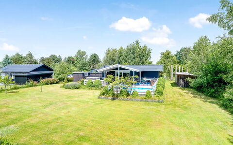 Asmine - 670M from the Sea: Roof, House, Home, Cottage, Siding, Estate, Driveway, Garden Buildings, Yard, Shed