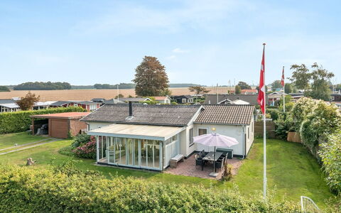 Hattie - 100M from the Sea: Building, House, Roof, Residential Area, Home, Land Lot, Estate, Cottage, Suburb, Landscaping