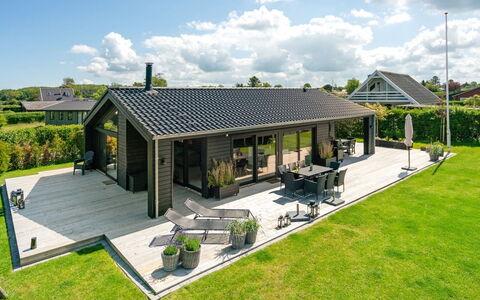 Kjell - 100M from the Sea: Blue, Shrub, Cottage, Groundcover, Garden, Estate, Shade, Landscaping, Farmhouse, Eco Hotel