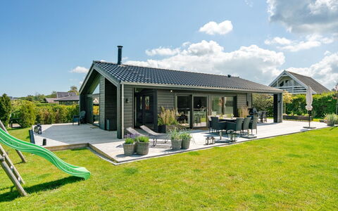 Kjell - 100M from the Sea: Blue, Shrub, Cottage, Groundcover, Garden, Estate, Shade, Landscaping, Farmhouse, Eco Hotel