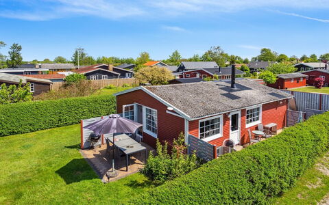 Amy - 150M from the Sea: House, Residential Area, Roof, Home, Cottage, Garden, Lawn, Estate, Suburb, Landscaping