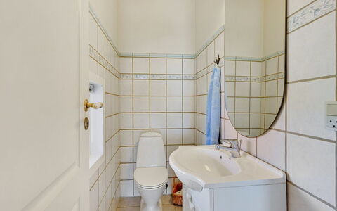 Dyrken - 200M from the Sea: Flooring, Bathroom, Plumbing Fixture, Floor, Interior Design, Toilet, Plumbing, Bathroom Sink, Tile, Toilet Seat