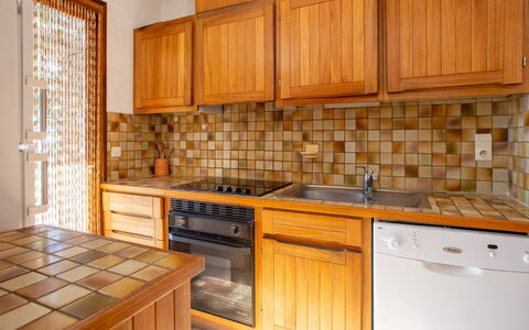 Village des Fourches: Cabinetry, Countertop, Property, Furniture, Kitchen, Building, Kitchen Appliance, Wood, Kitchen Stove, Interior Design