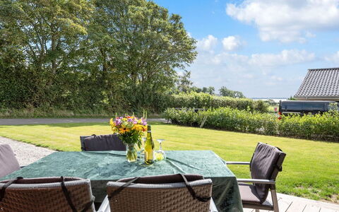 Rathi - 250M from the Sea: Furniture, Chair, Table, Outdoor Furniture, Kitchen & Dining Room Table, Outdoor Table, Shrub, Shade, Garden