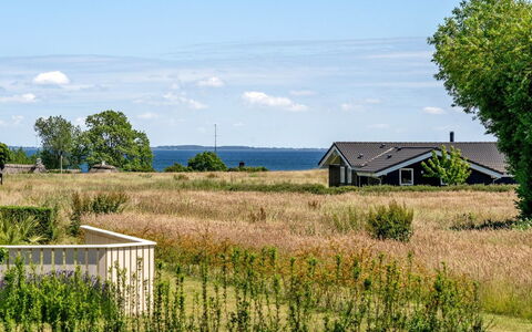 Ela - 500M from the Sea: Roof, House, Home, Cottage, Siding, Estate, Driveway, Garden Buildings, Yard, Shed
