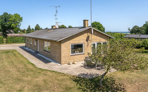 Ilda - 250M from the Sea: Roof, House, Home, Cottage, Siding, Estate, Driveway, Garden Buildings, Yard, Shed