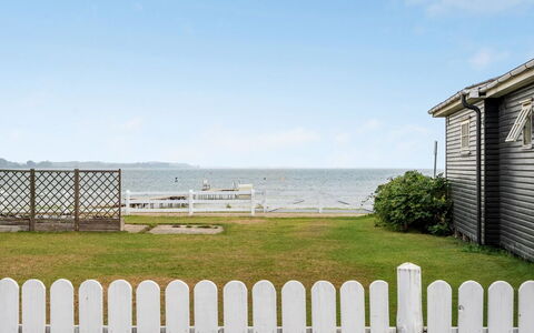 Pedersen - 50M from the Sea: Roof, House, Home, Cottage, Siding, Estate, Driveway, Garden Buildings, Yard, Shed