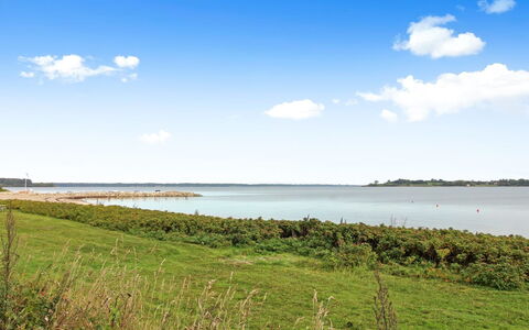 Cara - 200M from the Sea: Roof, House, Home, Cottage, Siding, Estate, Driveway, Garden Buildings, Yard, Shed