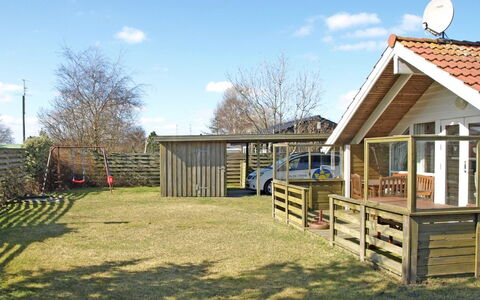 Ascan - 50M from the Sea: Roof, Cottage, Garden Buildings, Backyard, Yard, Siding, Shed, Porch, Lawn, Fence