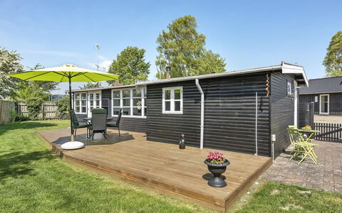 Tyyni - 75M from the Sea: Roof, House, Home, Cottage, Siding, Estate, Driveway, Garden Buildings, Yard, Shed