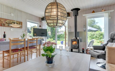 Tess - 50M from the Sea: Wood, Ceiling, Light Fixture, Living Room, Hardwood, Chair, Wood Stain, Natural Material, Wood Flooring, Chandelier