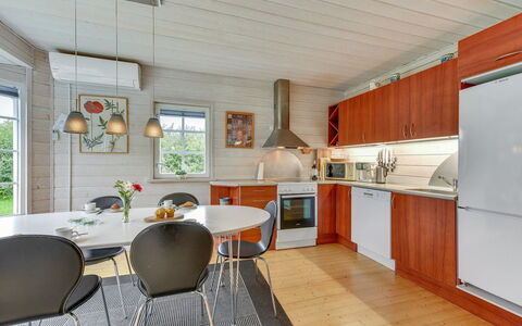 Liam - 800M to the Fjord: Flooring, Interior Design, Kitchen, Wood, Furniture, Ceiling, Floor, Countertop, Kitchen & Dining Room Table, Chair