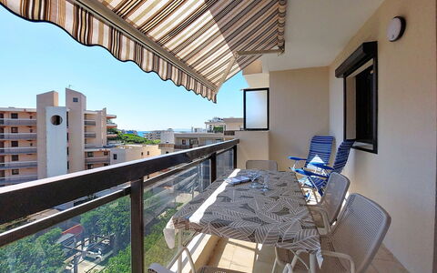 Le Lavandou 200: Apartment, Balcony, Furniture, Chair, Shade, Condominium, Outdoor Furniture, Outdoor Table, Kitchen & Dining Room Table, Wood Stain