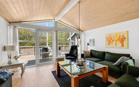 Emmanuela - 700M to the Fjord: Interior Design, Couch, Wood, Flooring, Ceiling, Furniture, Floor, Living Room, Wood Flooring, Room