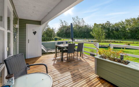 Fritzie - 600M to the Fjord: Chair, Hardwood, Garden, Deck, Kitchen & Dining Room Table, Shade, Plank, Wood Flooring, Wood Stain, Outdoor Furniture
