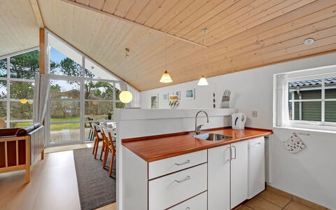Herminia - 350M to the Fjord: Flooring, Interior Design, Wood, Ceiling, Floor, Furniture, Kitchen, Countertop, Home, Cabinetry