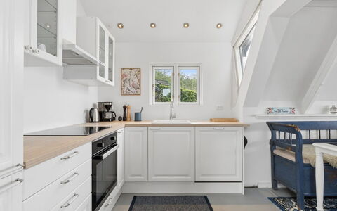 Fifi - 10M to the Fjord: Flooring, Interior Design, Kitchen, Cabinetry, Wood, Countertop, Furniture, Ceiling, Floor, Light Fixture