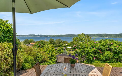 Stjerne - 300M from the Sea: Shrub, Furniture, Outdoor Furniture, Shade, Chair, Outdoor Table, Eco Hotel, Umbrella, Garden