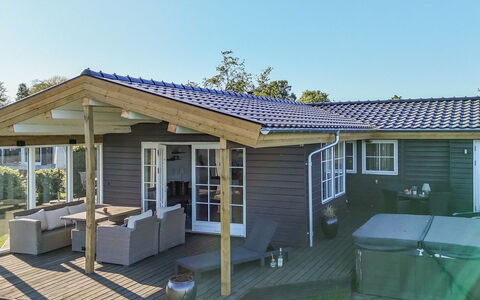 Orsa - 80M from the Sea: Roof, Cottage, Door, Porch, Siding, Outdoor Furniture, Garden Buildings, Deck, Outdoor Structure, Shade