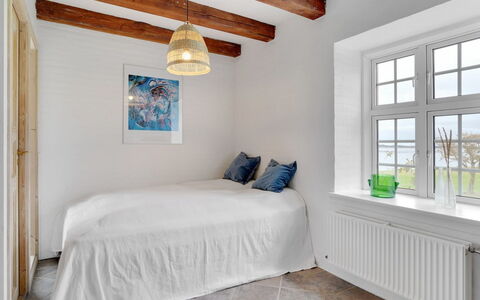 Thorge - 75M to the Fjord: Flooring, Floor, Wall, Interior Design, Bedroom, Wood, Bed, Ceiling, Room, Furniture