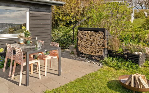 Nielsen - 30M to the Fjord: Furniture, Wood, Outdoor Furniture, Shrub, Chair, Garden, Table, Outdoor Table, Backyard