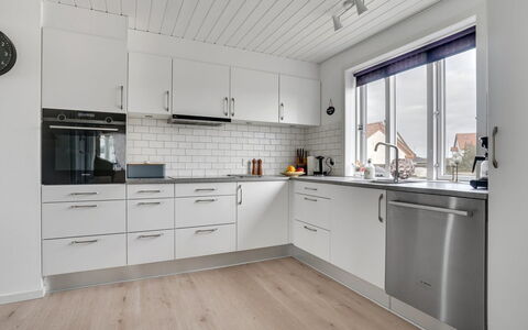Thilla - 100M from the Sea: Kitchen, Flooring, Cabinetry, Countertop, Wood, Interior Design, Floor, Kitchen Appliance, Ceiling, Major Appliance