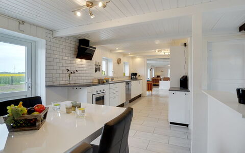 Ailke - 2Km to the Fjord: Ceiling, Home, Countertop, Cabinetry, Hardwood, Kitchen, Light Fixture, Winter, Kitchen & Dining Room Table, Daylighting