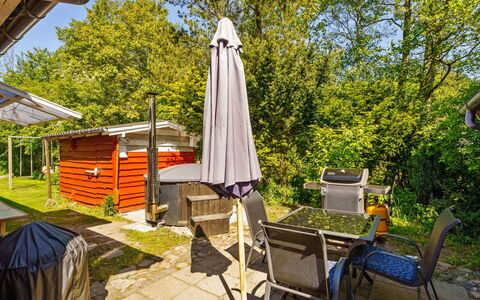 Flugha - 500M to the Fjord: Shrub, Garden, Chair, Cottage, Shade, Backyard, Yard, Garden Buildings, Lawn, Landscaping