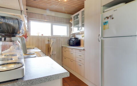 Ioar - 200M to the Fjord: Kitchen, Kitchen Appliance, Countertop, Interior Design, Major Appliance, Flooring, Wood, Floor, Cabinetry, Room