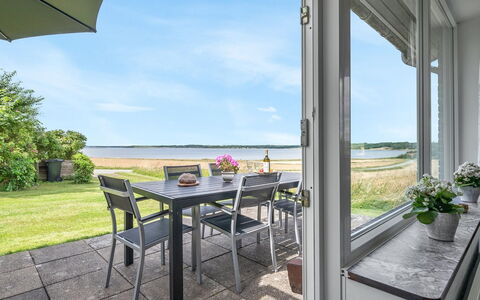 Ephra - 250M to the Fjord: Sea, Chair, Ocean, Coast, Kitchen & Dining Room Table, Outdoor Furniture, Shade, Hardwood, Outdoor Table, Balcony