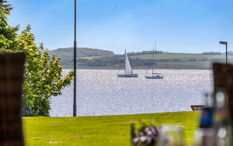 Kara - 100M to the Fjord: Blue, Shrub, Cottage, Groundcover, Garden, Estate, Shade, Landscaping, Farmhouse, Eco Hotel