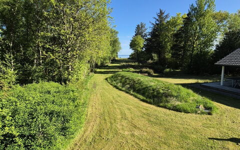 Aswarth - 50M to the Fjord: Blue, Shrub, Cottage, Groundcover, Garden, Estate, Shade, Landscaping, Farmhouse, Eco Hotel