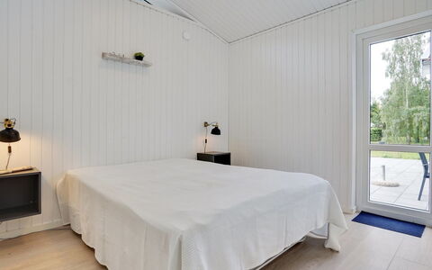 Bjarki - 800M from the Sea: Roof, House, Home, Cottage, Door, Siding, Deck, Porch, Plank, Hardwood
