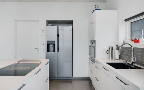 Anniina - 200M from the Sea: Kitchen, Countertop, Kitchen Appliance, Flooring, Major Appliance, Cabinetry, Interior Design, Wood, Floor, Furniture