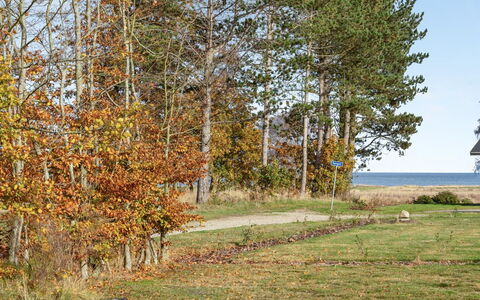 Joon - 300M from the Sea: Roof, House, Home, Cottage, Siding, Estate, Driveway, Garden Buildings, Yard, Shed