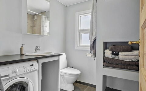 Kjartan - 1.2Km from the Sea: Washing Machine, Plumbing Fixture, Flooring, Floor, Bathroom, Interior Design, Clothes Dryer, Sink, Ceiling, Laundry Room