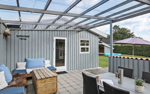 Kjartan - 1.2Km from the Sea: Roof, Home, Deck, Siding, Outdoor Furniture, Shade, Cottage, Porch, Outdoor Table, Patio