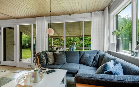 Fergie - 400M from the Sea: Furniture, Interior Design, Couch, Flooring, Wood, Floor, Ceiling, Living Room, Home, Lighting