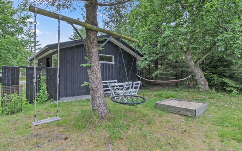Chrissie - 150M from the Sea: Roof, House, Home, Cottage, Siding, Estate, Driveway, Garden Buildings, Yard, Shed